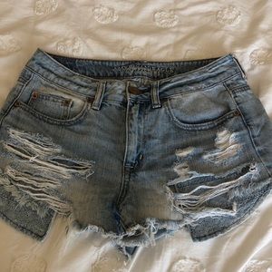 Distressed jean shorts with pocket detail